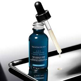 A.G.E Interrupter ultra serum, serum multi-correcteur pour ujne peau visiblement liftée par SkinCeuticals et sa pipette.